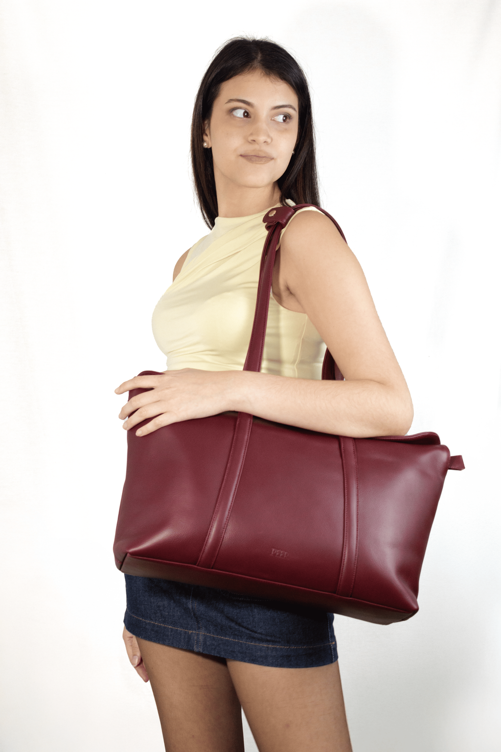 PEER CARTERA SADE VINO MODELO COMPLETO DIAGONAL